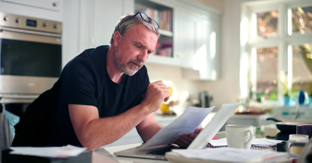 Image of a man looking over his retirement plan options