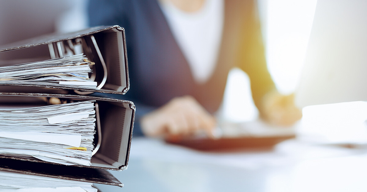 Image of a woman going through an audit