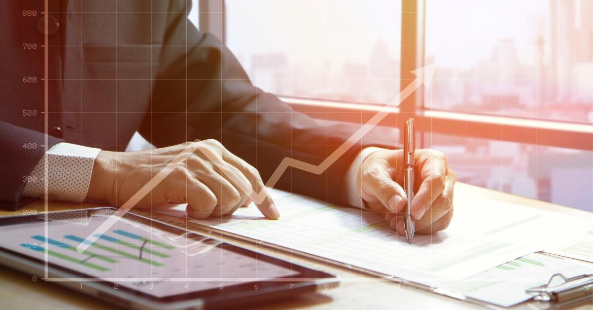 Image of someone going over cashflow documents